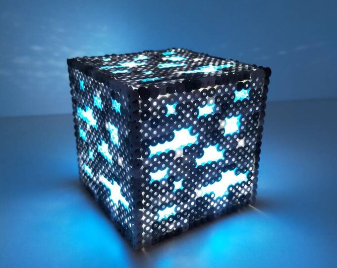 Blue illuminated pixel ore cube lamp