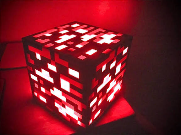 Red illuminated pixel ore block lamp